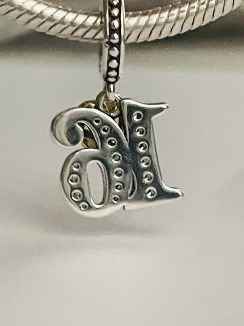 16th birthday charm letter detail close up