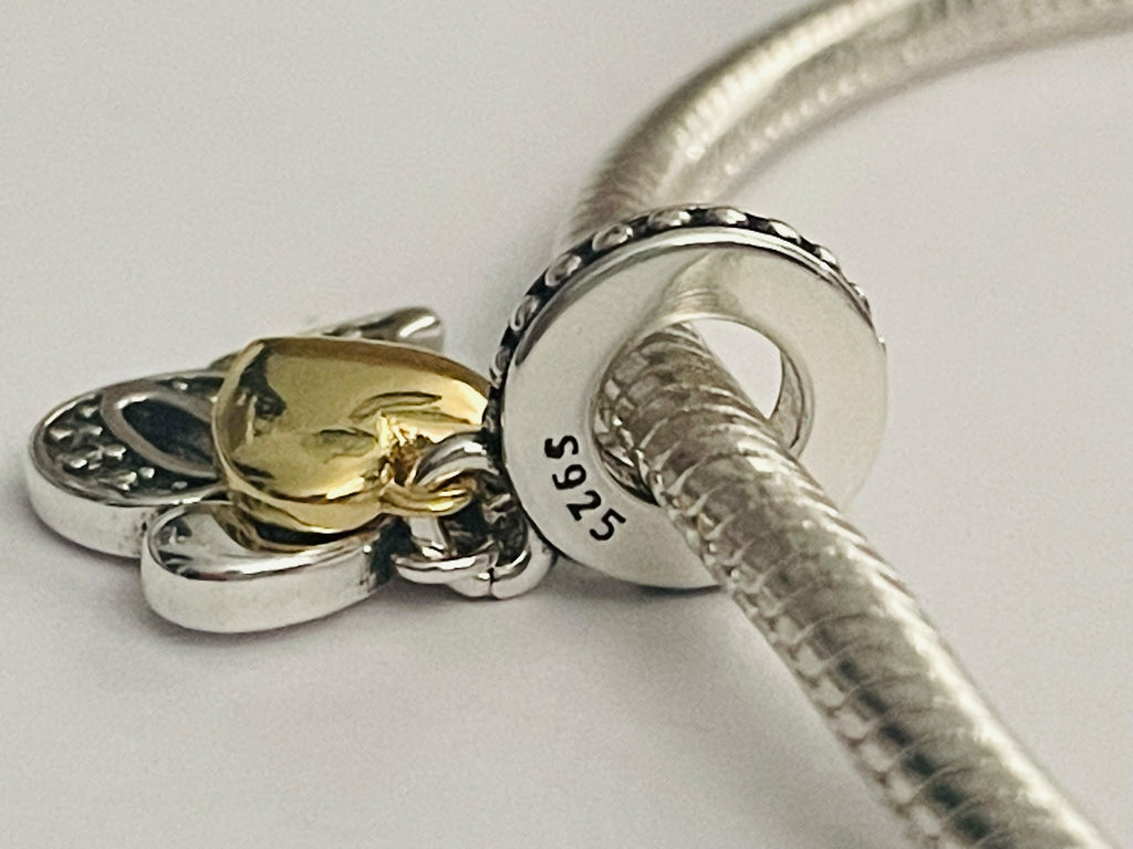 16th birthday charm back view on bracelet