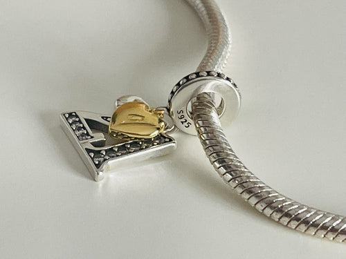 21st birthday charm back view on bracelet