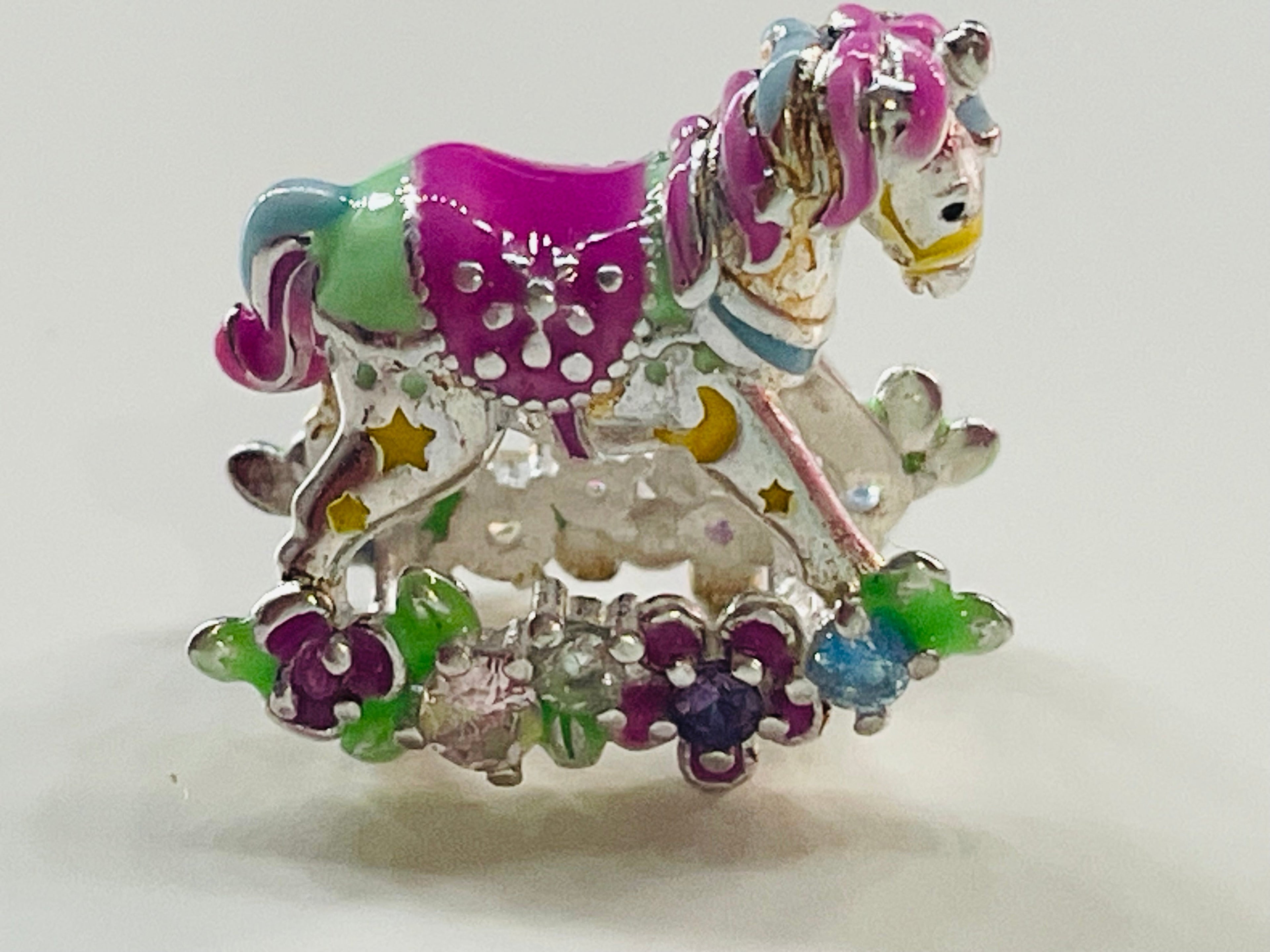 Rocking horse charm detail view