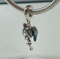 Harley Quinn dangle charm side view on bracelet